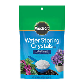 Miracle-Gro Water Storing Crystals package close-up showing moisture reservoirs for steady hydration.