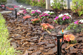 Mister Landscaper vinyl collar and flow-controlled coupler for secure spray connections.