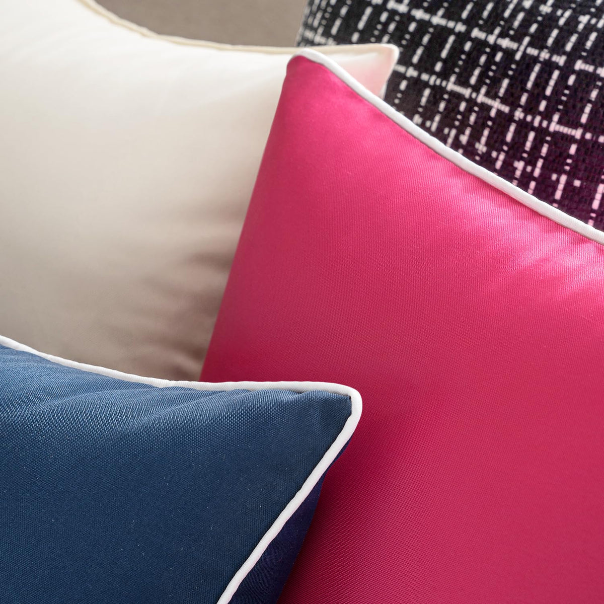 MIULEE farmhouse-style navy pillow cover adds cozy touch to living room.