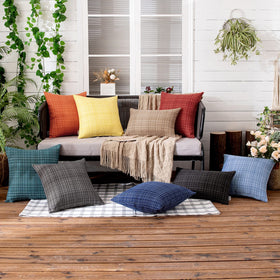 MIULEE navy pillow cover used on a living room couch