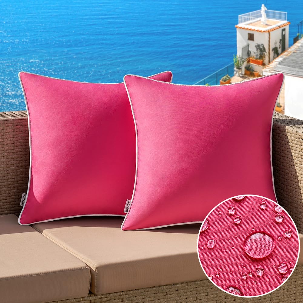 MIULEE hot pink outdoor pillow cover on patio sofa, weather-ready and easy to clean.