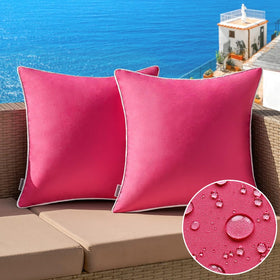 MIULEE hot pink outdoor pillow cover on patio sofa, weather-ready and easy to clean.