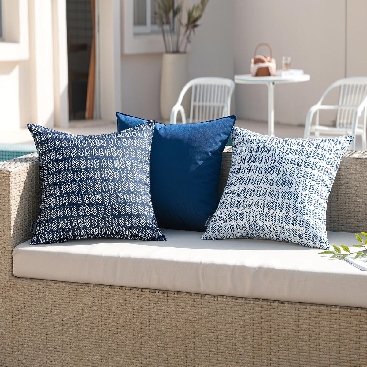MIULEE outdoor pillow on a patio setup for versatile outdoor decor