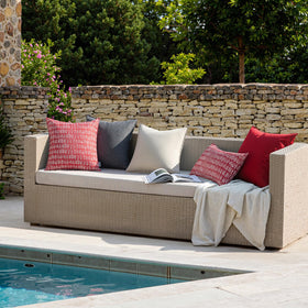 MIULEE outdoor pillow on patio sofa adds inviting comfort.