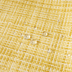 MIULEE yellow pillow cover on a patio sofa highlighting durable outdoor decor.