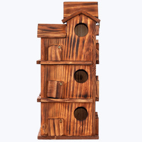 MIXUMON bird house in garden setting with greenery and sunlight.
