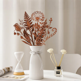 Mizelu rusted stakes offer effortless outdoor accent for yards and courtyards.