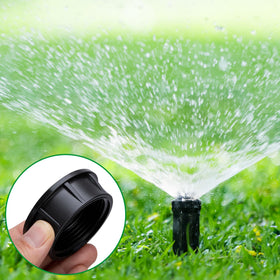 Mizelu head cap protecting irrigation components from dirt and debris during off cycles.
