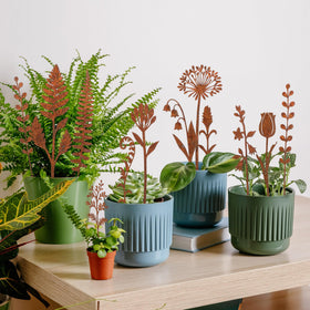 Mizelu weathered metal design resists wear and keeps decorative shapes durable.