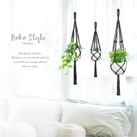 Mkono hanging planter holder in black adds texture to living room corners