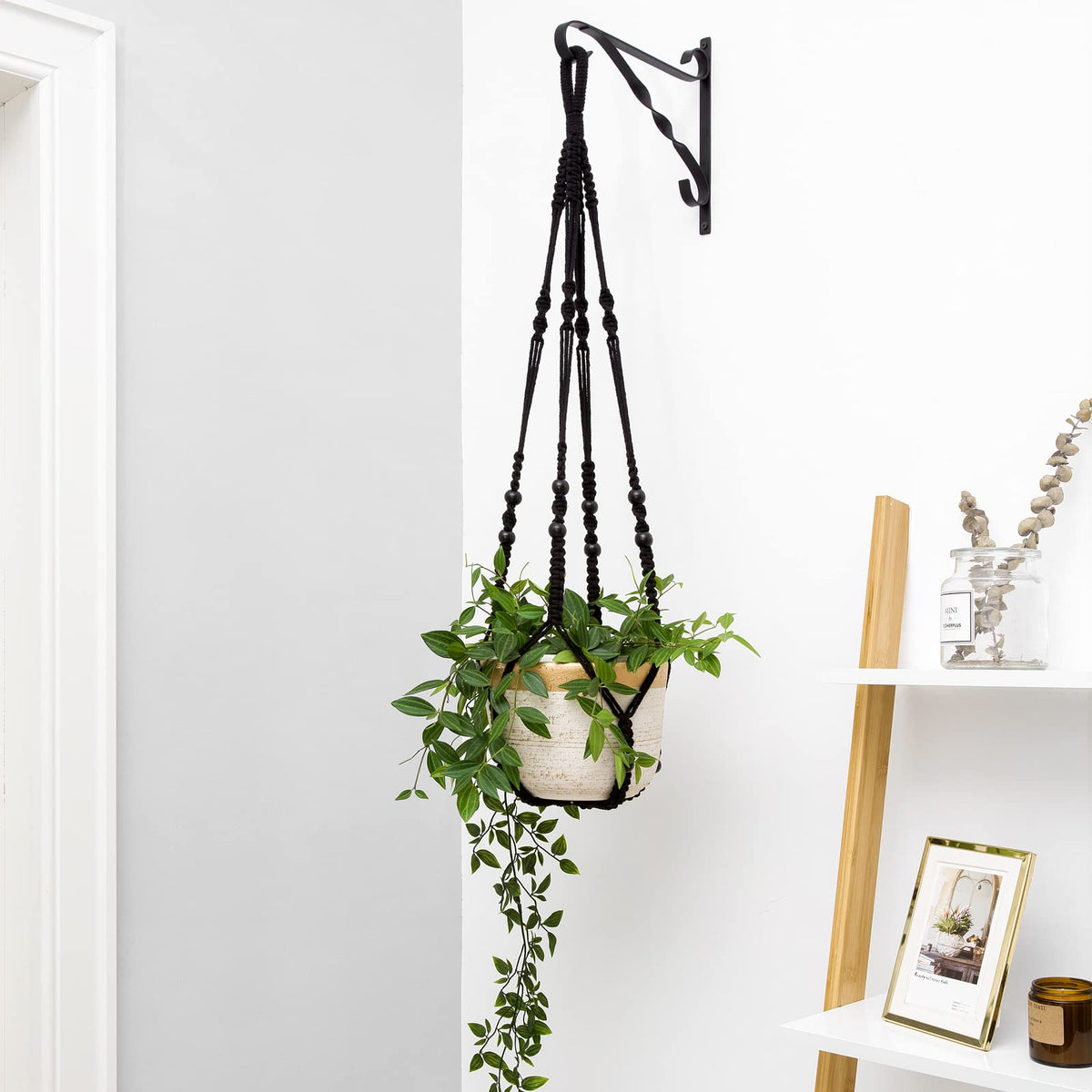 Mkono black macrame hanger for indoor/outdoor use enhances your space.