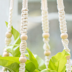 Mkono cotton cord weave delivers sturdy support for various planters.