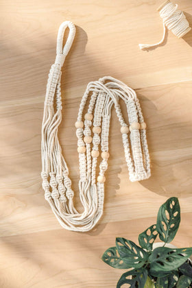 Mkono long reach helps suspend larger pots with ease in any room.