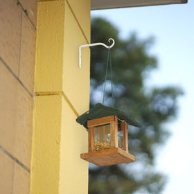 Mkono lantern and hook combo adds focal detail for porches.