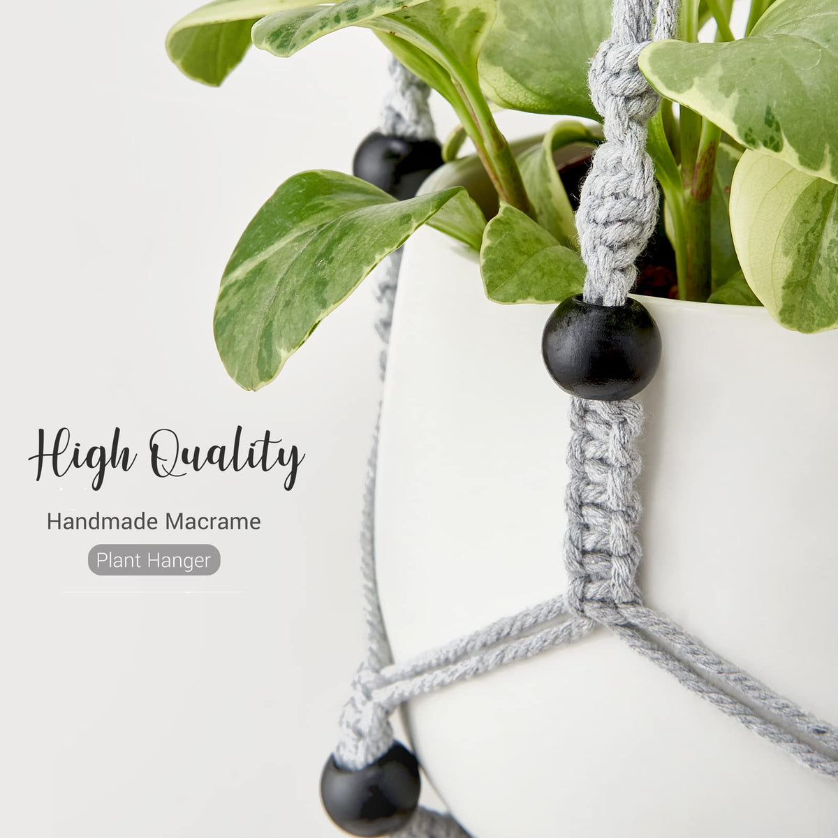 Mkono macrame plant hanger grey in living room scene enhances style.