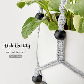 Mkono macrame plant hanger grey in living room scene enhances style.