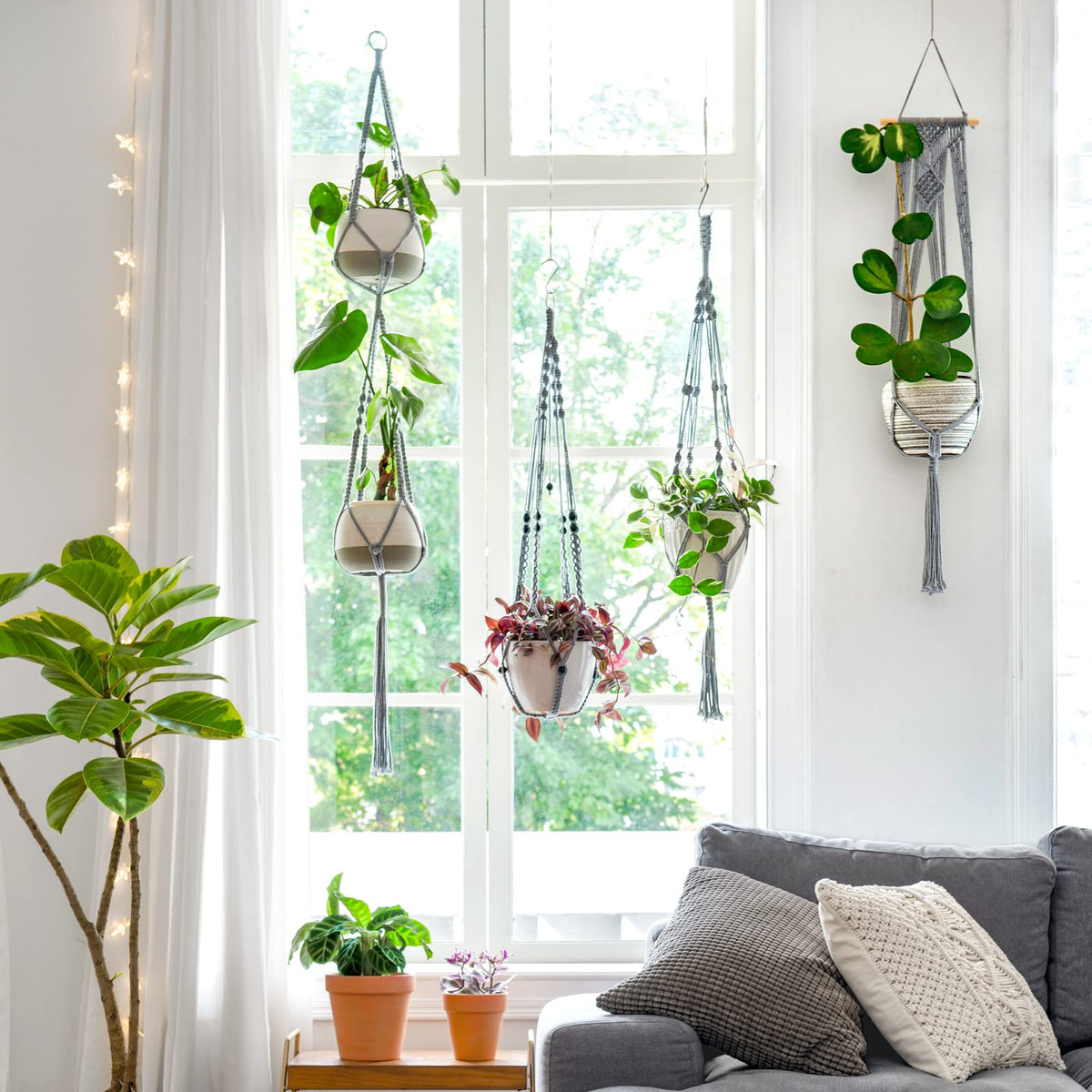 Mkono macrame plant hanger grey outdoor use suits balcony decor.