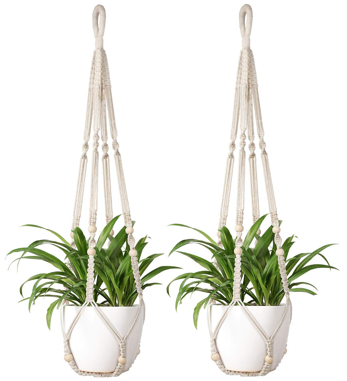 Mkono macrame plant hanger with wood beads holds a 9-inch pot for balcony decor.