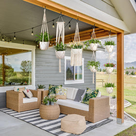 Mkono macrame plant hangers accommodate various pot sizes for versatile displays.