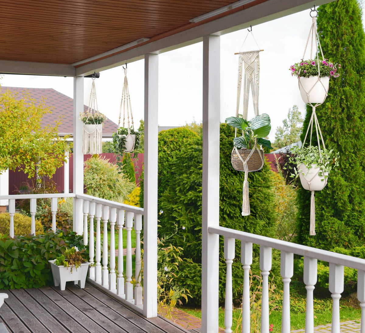 Mkono macrame plant hangers wall hook display enhances boho home vibe.