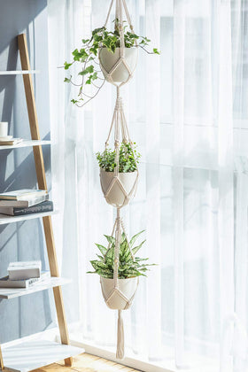 Mkono macrame planter basket close-up with wood beads and knots