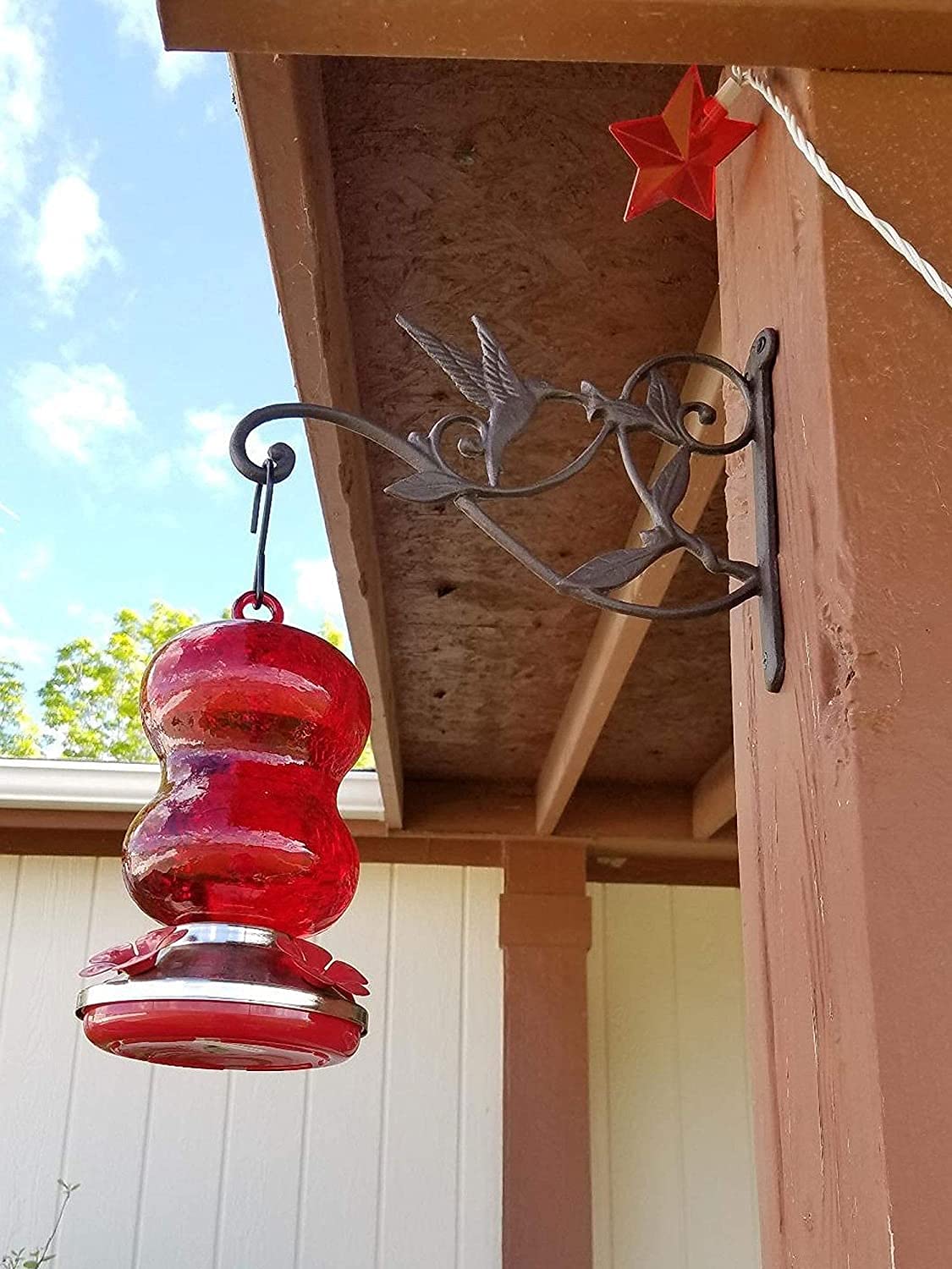 Mkono outdoor-decor hanger designed for garden posts and fence installations.