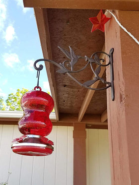 Mkono outdoor-decor hanger designed for garden posts and fence installations.