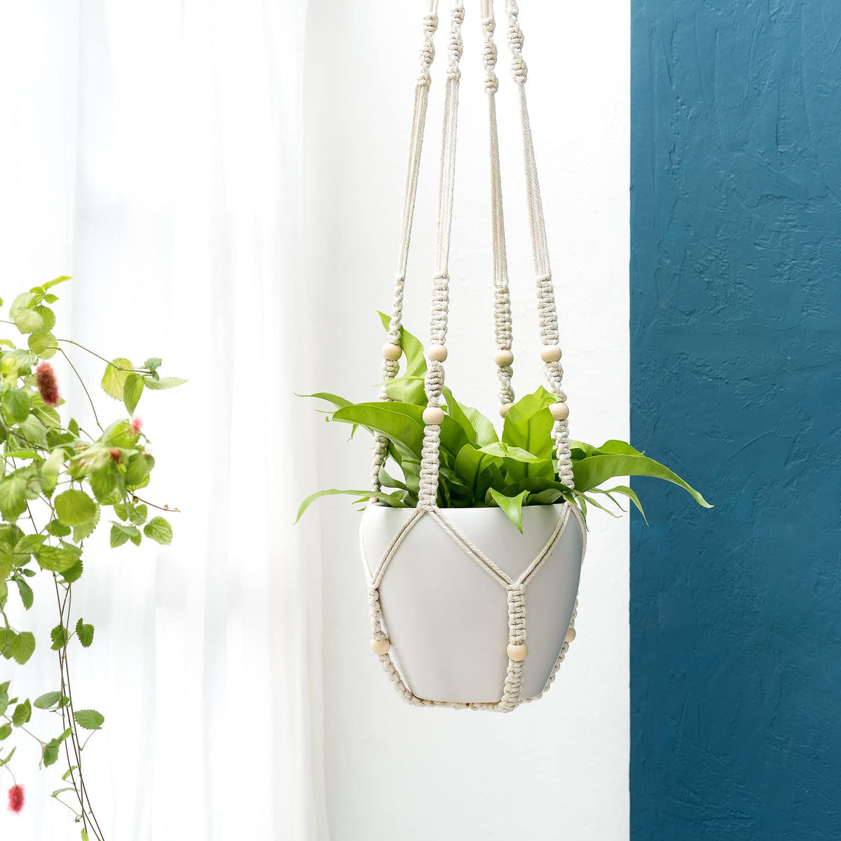 Mkono indoor-outdoor compatible hanger fits versatile spaces for planters up to 12 inches.