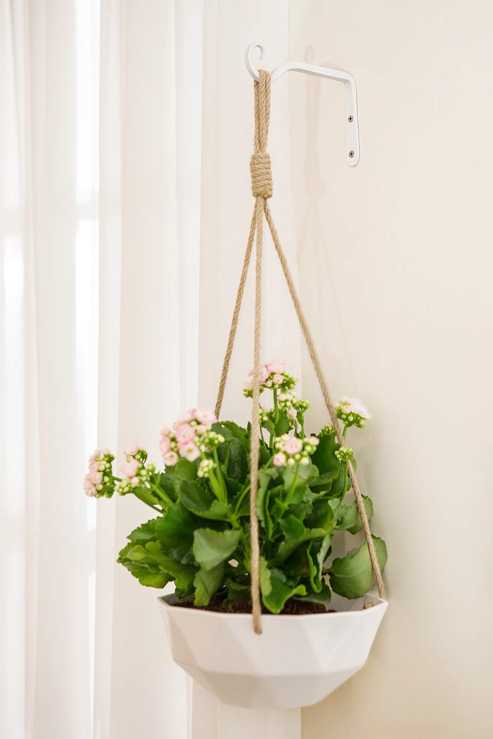 Mkono decorative metal wall hook adds vintage charm to entryways.