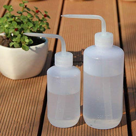 Mkono 250ml watering can with scale marks for accurate dosing.