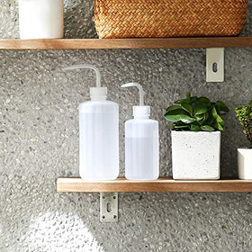 Mkono 500ml watering can with bend mouth for easy base watering.