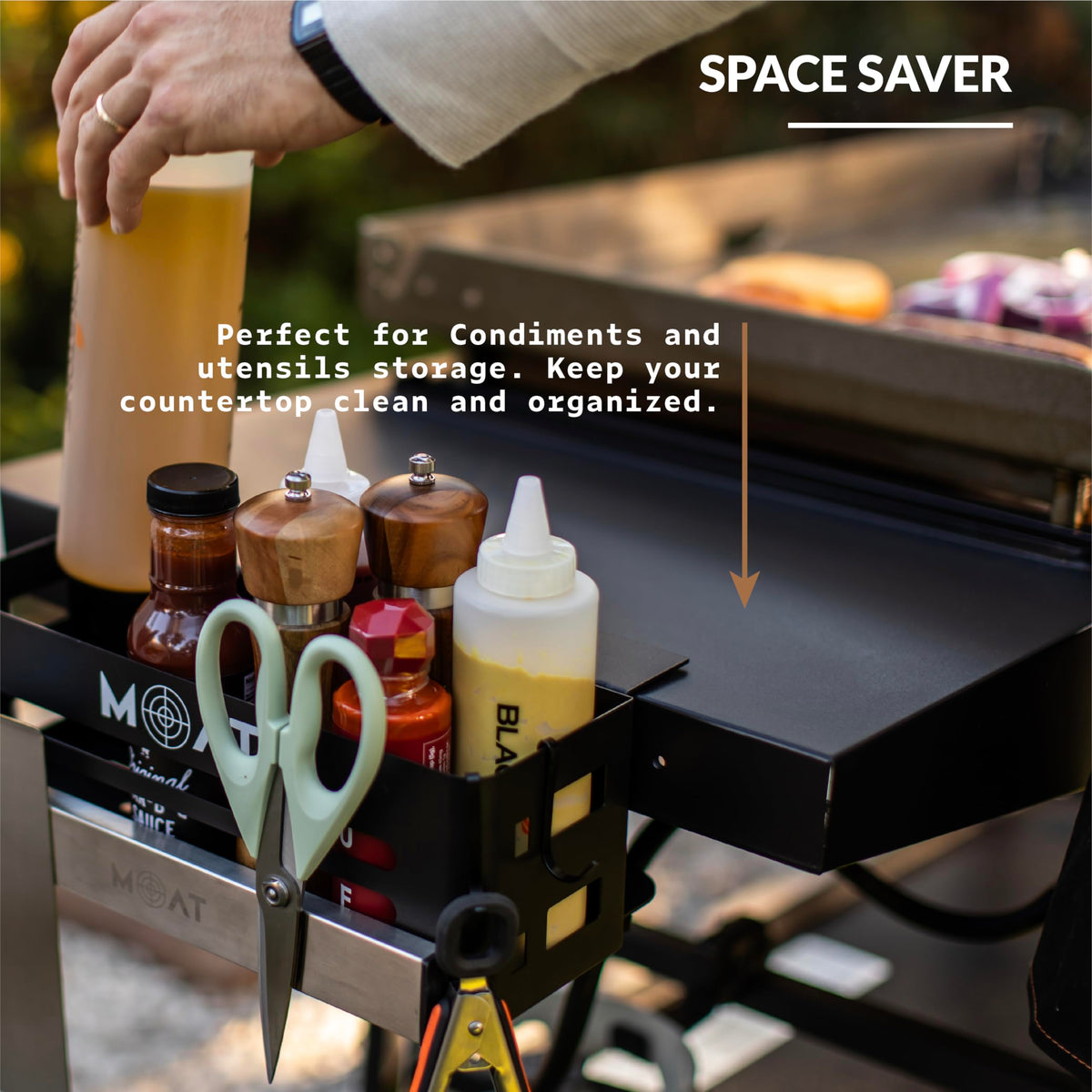 MOAT trash bag holder keeps waste off the counter and easy to dispose.