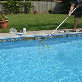 Mocolation pool brush on concrete surface showing safe scrubbing.