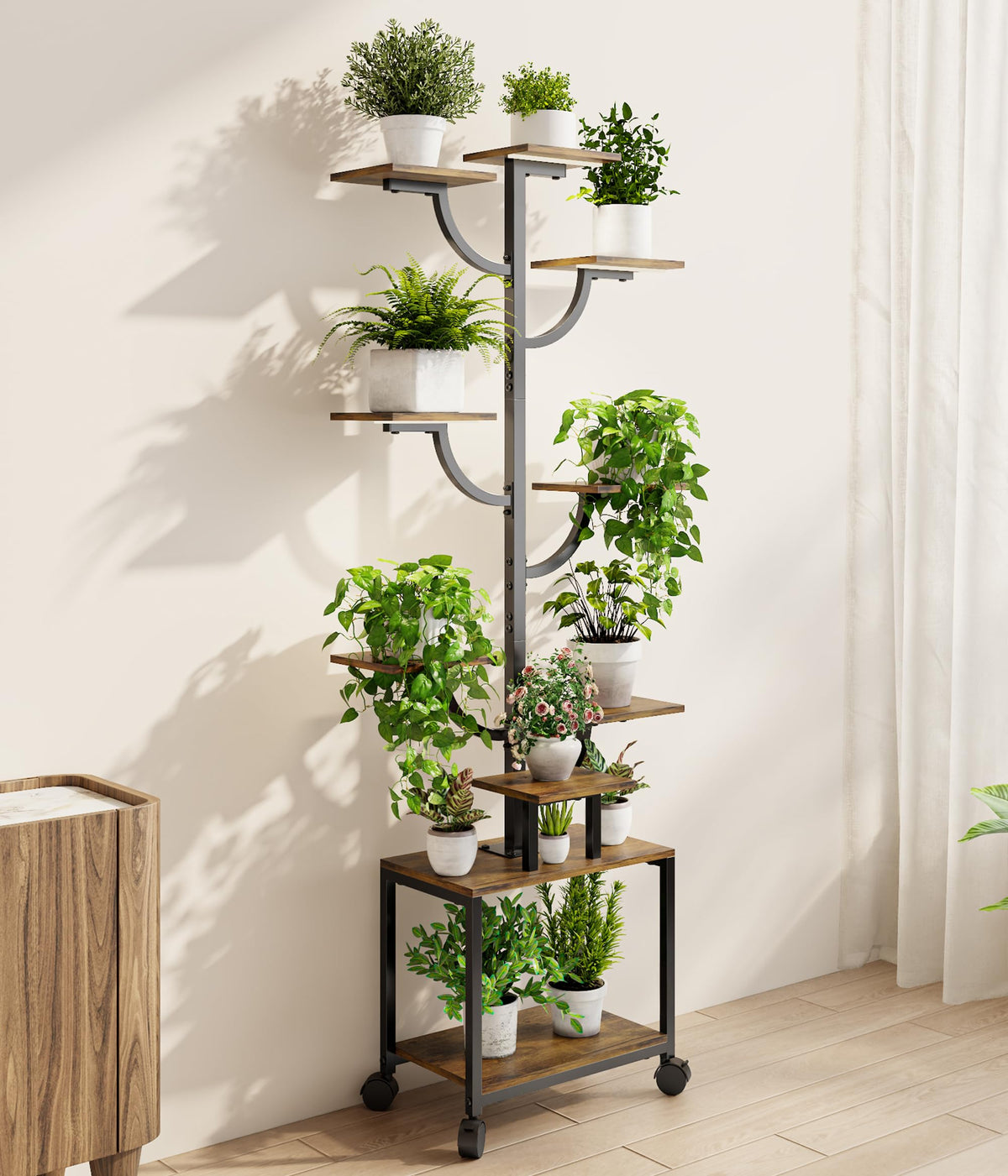 Mogaath 9-tier display holds diverse plants for a visually rich home garden.