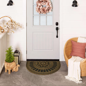 Mohawk Home Swirl Charcoal grooved surface helps remove debris before entering.
