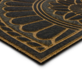 Mohawk Home Swirl Charcoal rubber backing provides grip on hard flooring.