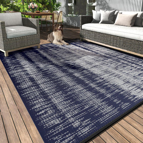 MontVoo outdoor rug 5x8 waterproof close-up shows weave and quick-dry surface for patios.