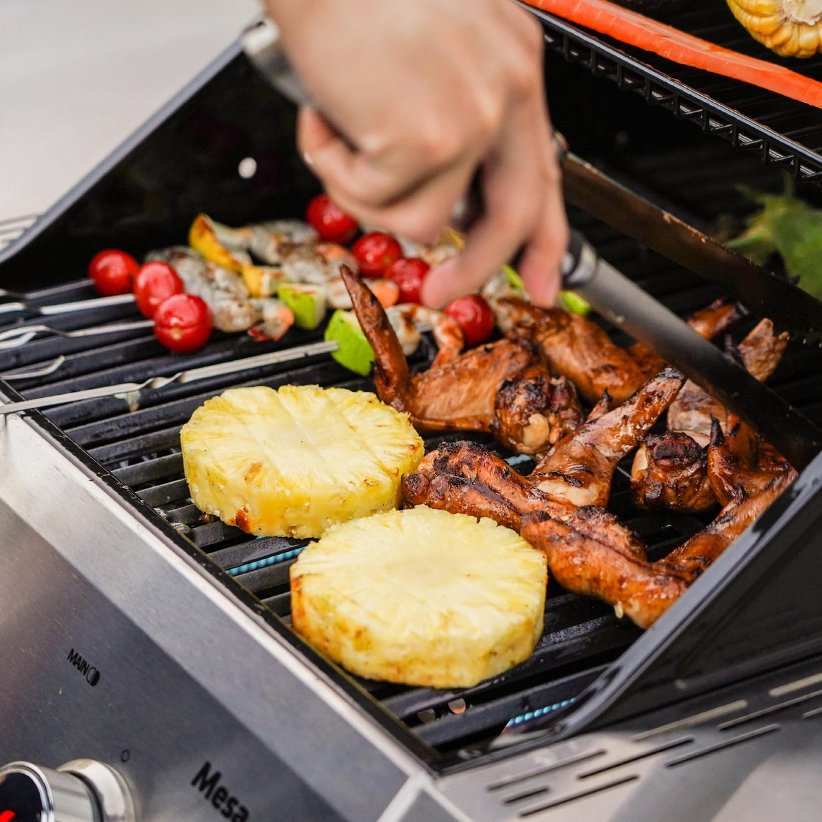 Monument Grills Mesa200S built-in bottle opener and hooks keep tools ready