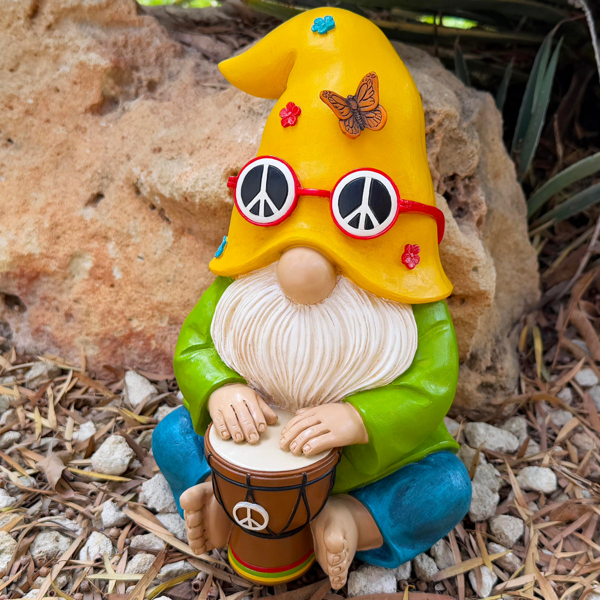 Mood Lab resin garden gnome with sun-protected finish endures sunny days.