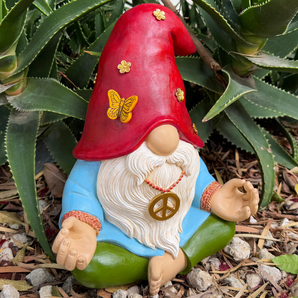 Mood Lab hand-painted resin gnome adds whimsy with durable garden charm.