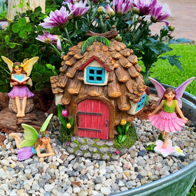 Mood Lab pinecone fairy figures hand-painted for colorful indoor shelves