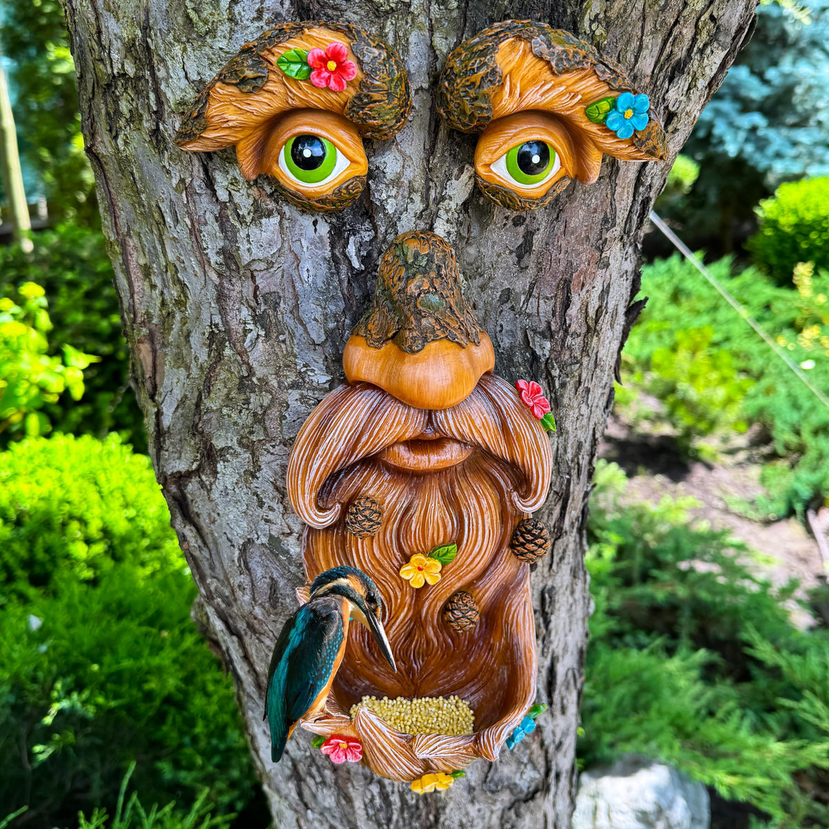 Mood Lab Tree Face Decor bird feeder invites birds to visit yard.