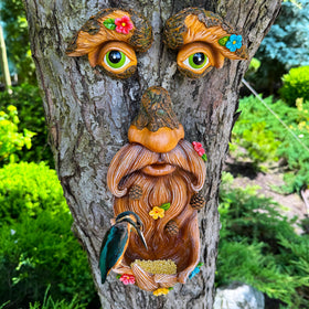 Mood Lab Tree Face Decor bird feeder invites birds to visit yard.