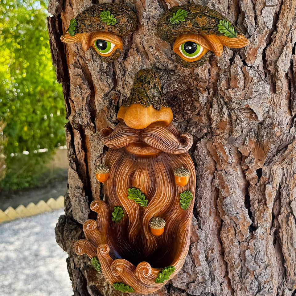 Mood Lab Tree Face Decor with acorns doubles as a decorative bird feeder outdoors