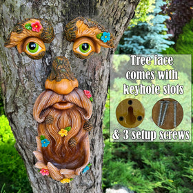  Mood Lab tree hugger art perched on a trunk as yard focal point.