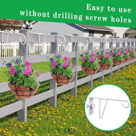 Moonoom hooks installed along fence displaying hanging plants on a garden fence.
