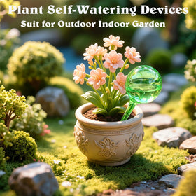 MOONSOUND self-watering globe outdoors supporting garden beds and containers.