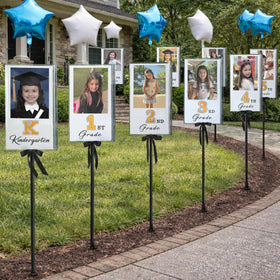 MOREDOTS graduation yard sign kit laid out for easy setup and photo milestones.