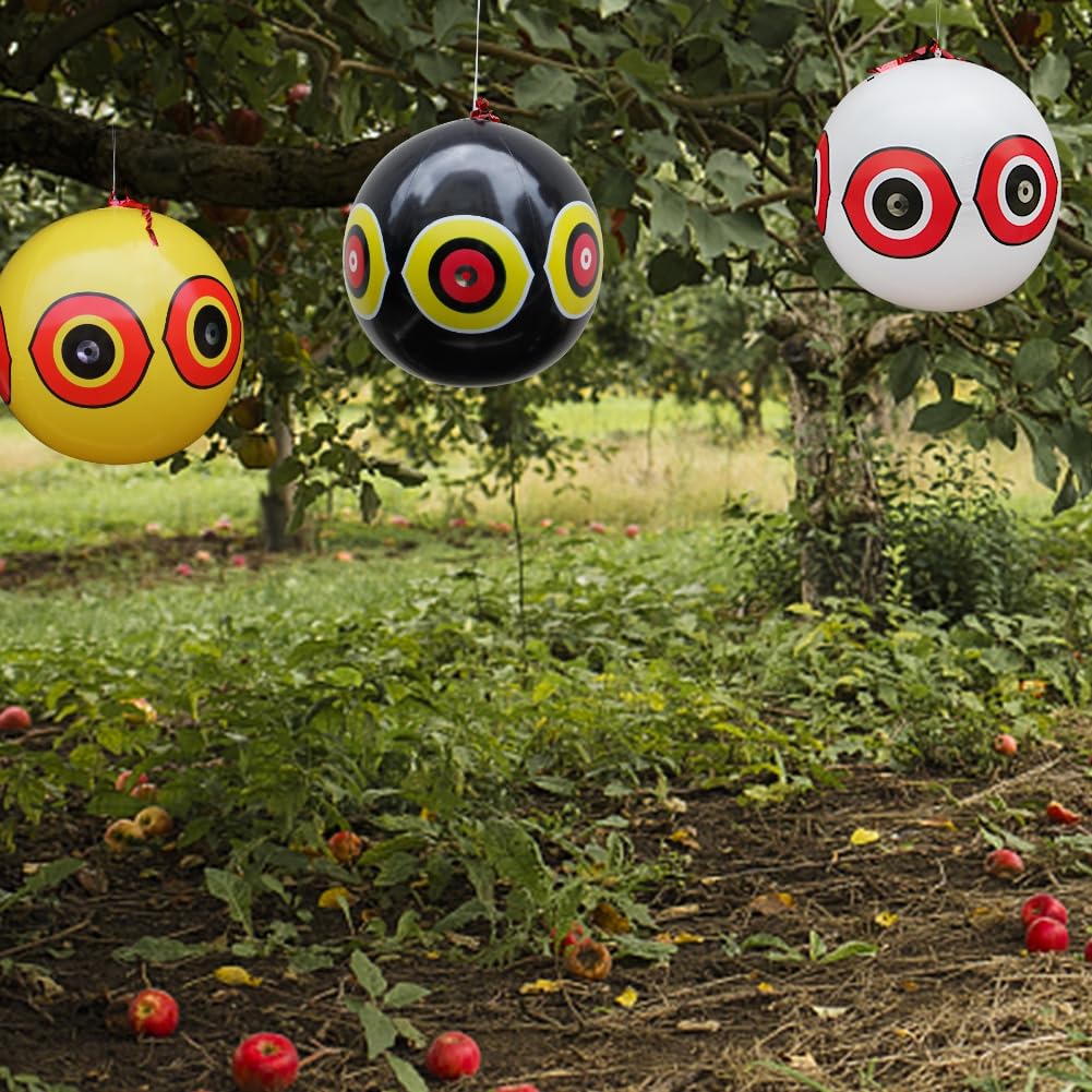 MorTime garden balloon deters birds near fruit trees using light and motion cues.
