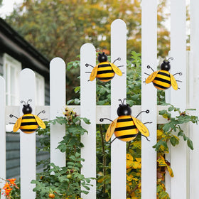 MorTime metal bee wall art displayed on a table adds whimsical focal point.